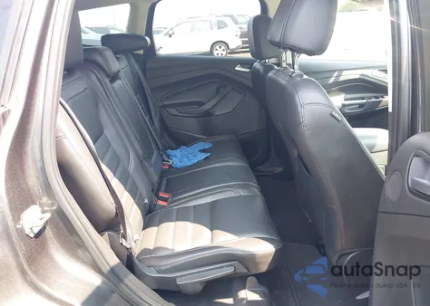 2017 Ford Escape Titanium z USA, uszkodzony, nr VIN 1FMCU9J99HUE27597